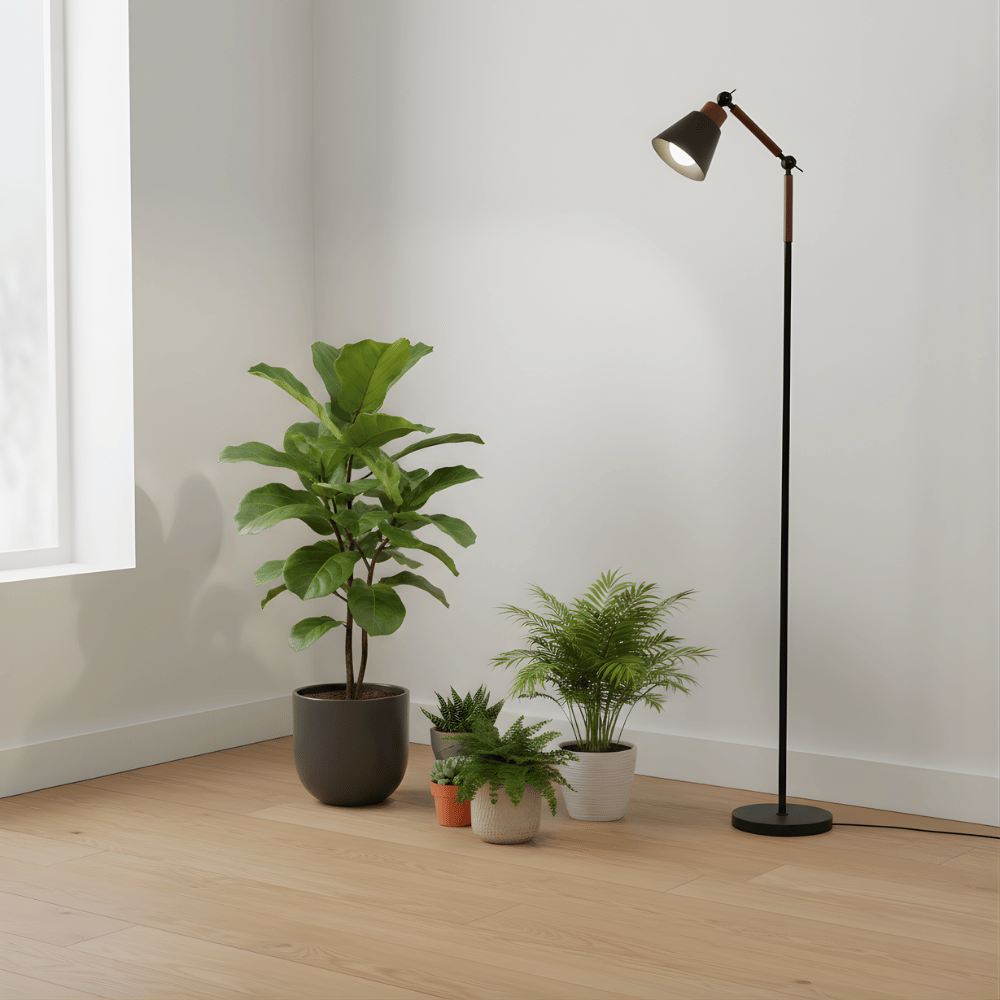 Floor grow light and potted plants in a room with a window